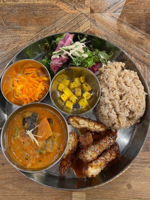 The Tempe-Katsu curry was delicious! I really liked the variety of curry and the salad! I also got a vegan cheese cake for dessert and it was amazing! at Sasaya Cafe in Tokyo