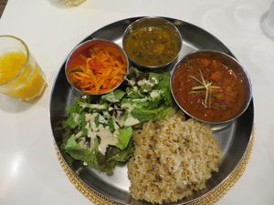 Rice and salad with assorted vegetable chutneys at Sasaya Cafe in Tokyo