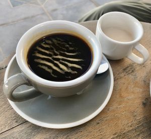 Americano with oat milk at Amongst Few in Abu Dhabi