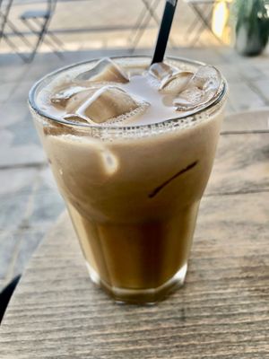 Iced oat milk maple latte at Amongst Few in Abu Dhabi