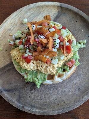 Vegan version of the Mexican waffle with scrambled tofu instead of poached egg. Yum! at EatWise Cafe in Phuket