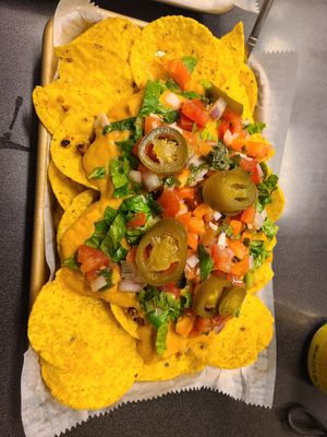 Quinoa nachos with extra cheese sauce at KNOW Eatery in Lafayette