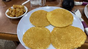 Gluten free & vegan pancakes with home fries  at Sawyer's Farmhouse Breakfast in Pigeon Forge