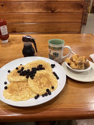 Gluten-free/ vegan pancakes with blueberries and house fries  at Sawyer's Farmhouse Breakfast in Pigeon Forge