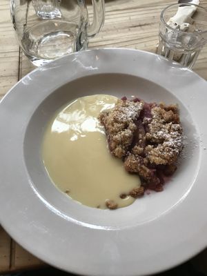 Apple and berry crumble with soya custard  at Playwrights in Coventry