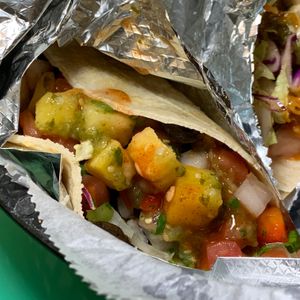 Build-Your-Taco: Flour Tortilla, Thai Chili Tofu, Onions, Poblanos, Cilantro, Pico de Gallo, Barrio Slaw, Salsa Verde, Barrio Secret Sauce at Barrio in Kalamazoo