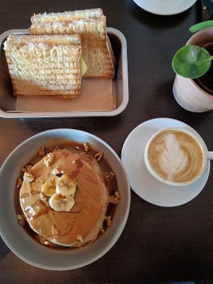 Cheese & ham toast, peanut butter & banana pancakes. at GAL Cafe in Lisbon