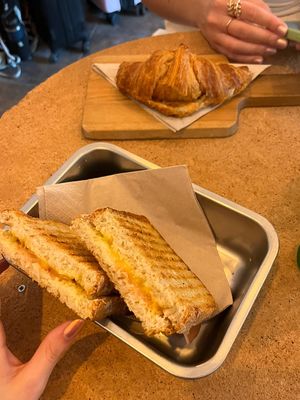 Ham and cheese toasted sandwich and a croissant with fig compote  at GAL Cafe in Lisbon