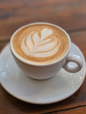 Flat white with oat milk at GAL Cafe in Lisbon