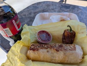 Bean & Cheese burrito with a Chile Güero Toreado. at All Vegan Franks - Ghost Kitchen in Los Angeles