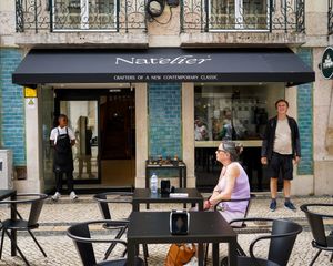 Nat'elier outside sitting (right in front of Santa Justa lift) at Nat'elier | Pastel de Nata in Lisbon
