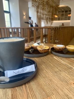 All the vegan nata flavors and an oat milk latte   at Nat'elier | Pastel de Nata in Lisbon