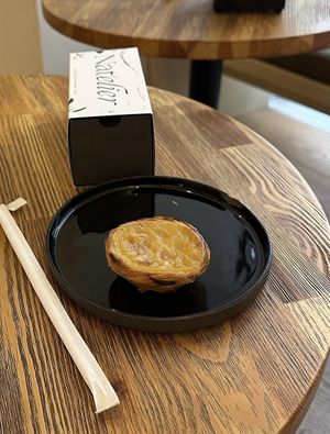 Traditional pastel de nata, as apple/cinnamon and creme brulee flavor to go.  at Nat'elier | Pastel de Nata in Lisbon