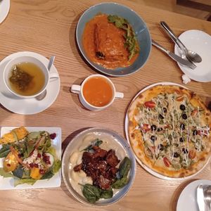 Group shot with creamy gnocchi and black pepper steak at WellSmoocht in West Singapore