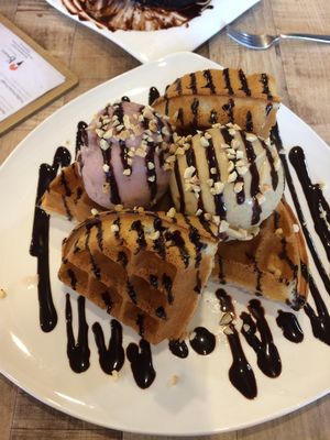 Waffle with strawberry and salted caramel ice cream  at WellSmoocht in West Singapore