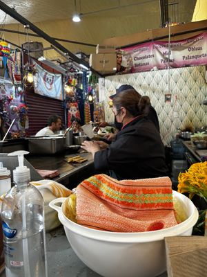 Chefs cooking the tacos   at Trinidad Ritual de Sabores in Mexico City