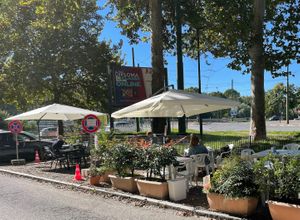 The outdoor area on the other side of the street at Ratatouille in Turin