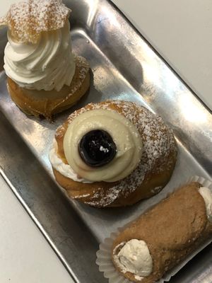 Chou with chantilly cream, zeppola di San Giuseppe, and butter peanut cannolo at Ratatouille in Turin