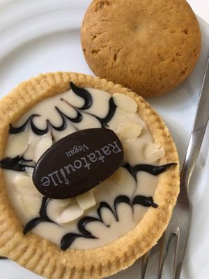 Coconut almond tart and chocolate gianduia biscotto  at Ratatouille in Turin