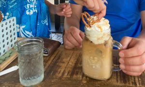 latte with vegan whipped cream!  at Santos Coffee With Soul in Oranjestad