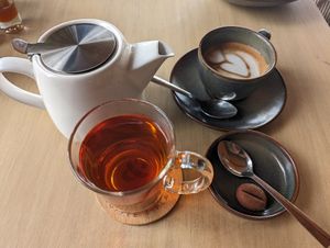 Coffee with almond milk and tea at Coffee & Plant in Nairobi