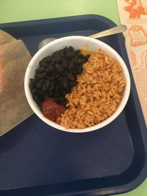 Beans and rice. Watch out for the hot sauce! at Taco Party in Somerville