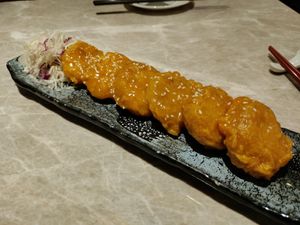 Fried lotus root stuffed with taro and coated in a sweet sauce at Yang Shin 養心茶樓 in Taipei