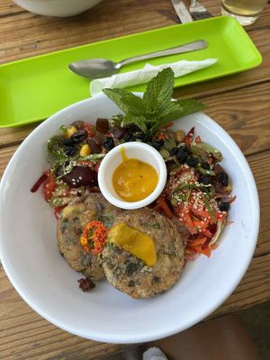 Potato? Fritters and fresh salad with passion fruit dressing at Laurel Vegan Bistro Gluten-Free in Palomino