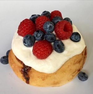 Vanilla Frosting, Blueberries, and Raspberries! at Cinnaholic in Queen Creek