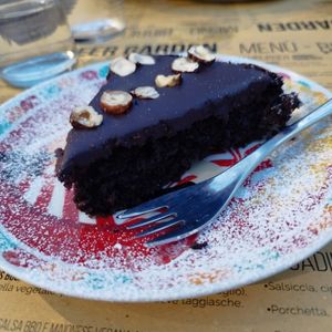 Torta al cioccolato e nocciole fatta in casa at Beer Garden in Cotignola