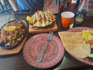 Vegan nachos with tofu and vegan fajitas with tofu mix at TNT - 66 in Croydon