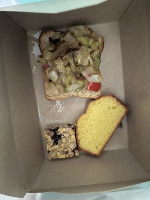Grilled veg on toast and some pastries as part of vegan breakfast   at The Noverian Bios Santorini, Vegan Boutique Hotel in Santorini