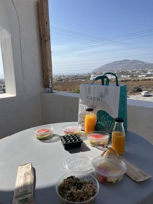 Vegan breakfast and views from balcony on day 1  at The Noverian Bios Santorini, Vegan Boutique Hotel in Santorini