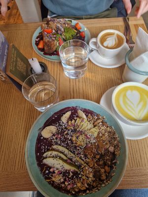 Acai bowl, French toast, golden milk, flat white at Good One Café - Schanze in Hamburg