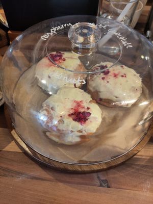 Slightly melty but delicious raspberry and white choc doughnuts! at Oat and Bean in Cardiff