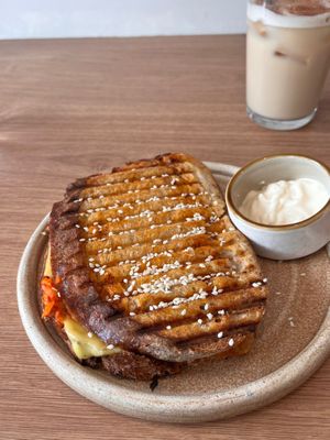 I had the Kimchi and Cheeze Toastie with an Iced Chai Latte. at Oat and Bean in Cardiff