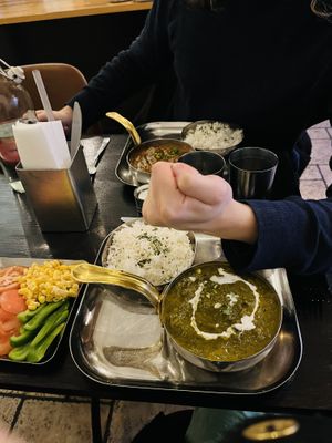 Side salad, palak tofu (closest); tofu masala  at Naansense in Gothenburg