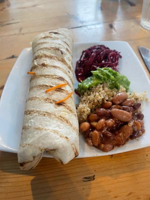 Onion bhaji wrap with small side salad  at Dave's Pop Up Vegan Cafe - temporarily closed in Knoydart