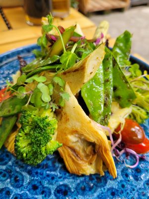 Grilled Artichoke with asparagus and snow peas, and mashed potatoes dish at Soul Kitchen in Sofia
