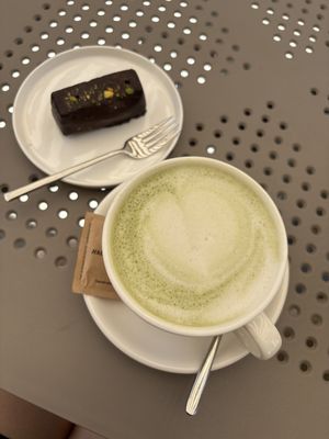 Pistaccio vegan cheesecake and matcha latte with oat milk  at Energy Life Kitchen - ELK in Kaunas