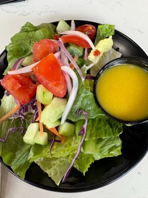 Salad with that amazing lemon dressing! Wow! Try their Summer Berry Salad while it's available. And this lemony dressing is now available to purchase, so you can get some to use at home! Perfect! at Roman's Pizza House in Absecon