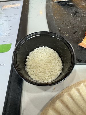 The vegan parmesan cheese they gave me    at Roman's Pizza House in Absecon