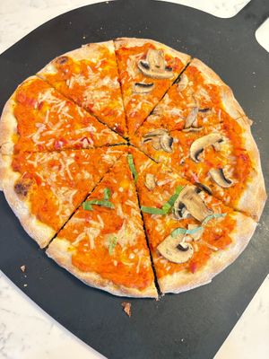 Vegan Veggie Heaven, half mushroom, half plain. This is made with a "Euro sauce" called zacusca, made with roasted eggplant & red peppers. Fire! So unique. at Roman's Pizza House in Absecon