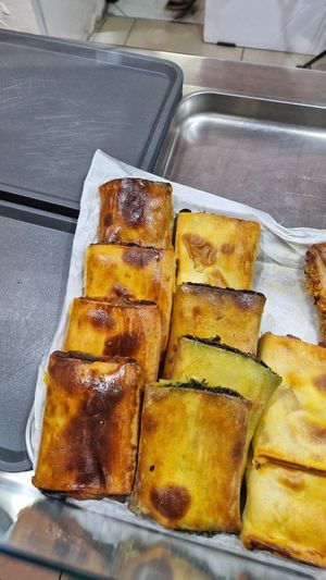 Stuffed pastries: eggplants or spinach and olives at PastaRun in Siracusa