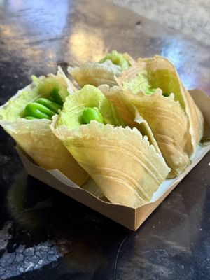 Pandan crepe from a different booth at same markett offering vegan  at Lanna Square Vegan in Chiang Mai
