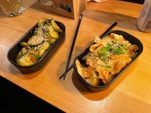 Starters, cucumber salad and Kimchi at Kukku Ramen in Ulm