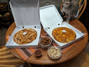 Grilled onion pizza, dragon pizza, mac and cheeze, schnitzel bites at Lala's Recipes Kenya in Nairobi