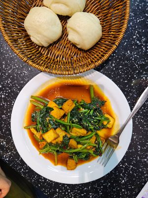 Tofu with spinach in garlic sauce & rice flour dumplings at China Town  in Almaty