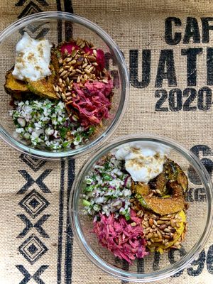 Buddha bowl from Buddha Eats, Organic Whole food plant based. 
Roasted marrow and cardamom coconut yoghurt, kohlrabi salad, carrot beet and cabbage slaw, turmeric and ginger hummu at THISiS BUDDHA EATS in Croyde