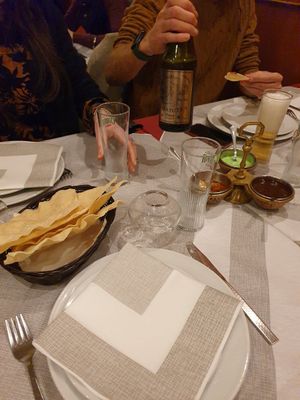 Pane e sardine di accompagnamento. La salsa verde è vegetariana at Gandhi in Padua